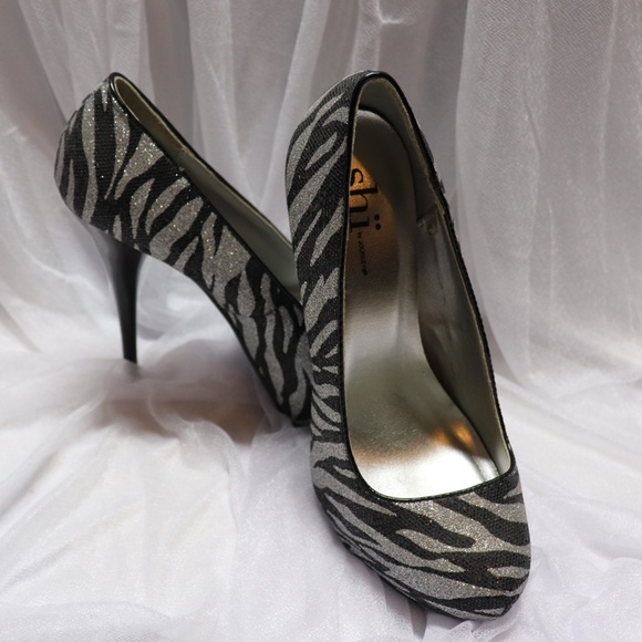 Shi by JOURNEYS Shoes - Shi by journeys . Zebra heels size 7